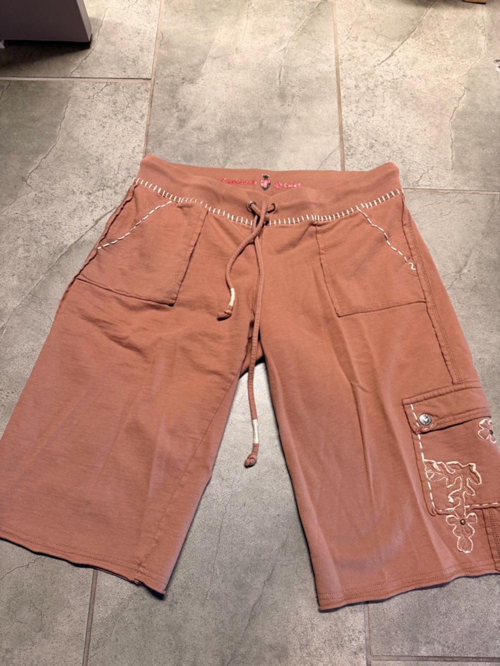Twisted heart knee length sweats. Size medium